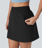 Jupe mini trapèze 2-en-1 taille haute avec boutons-pression et poches pour la randonnée