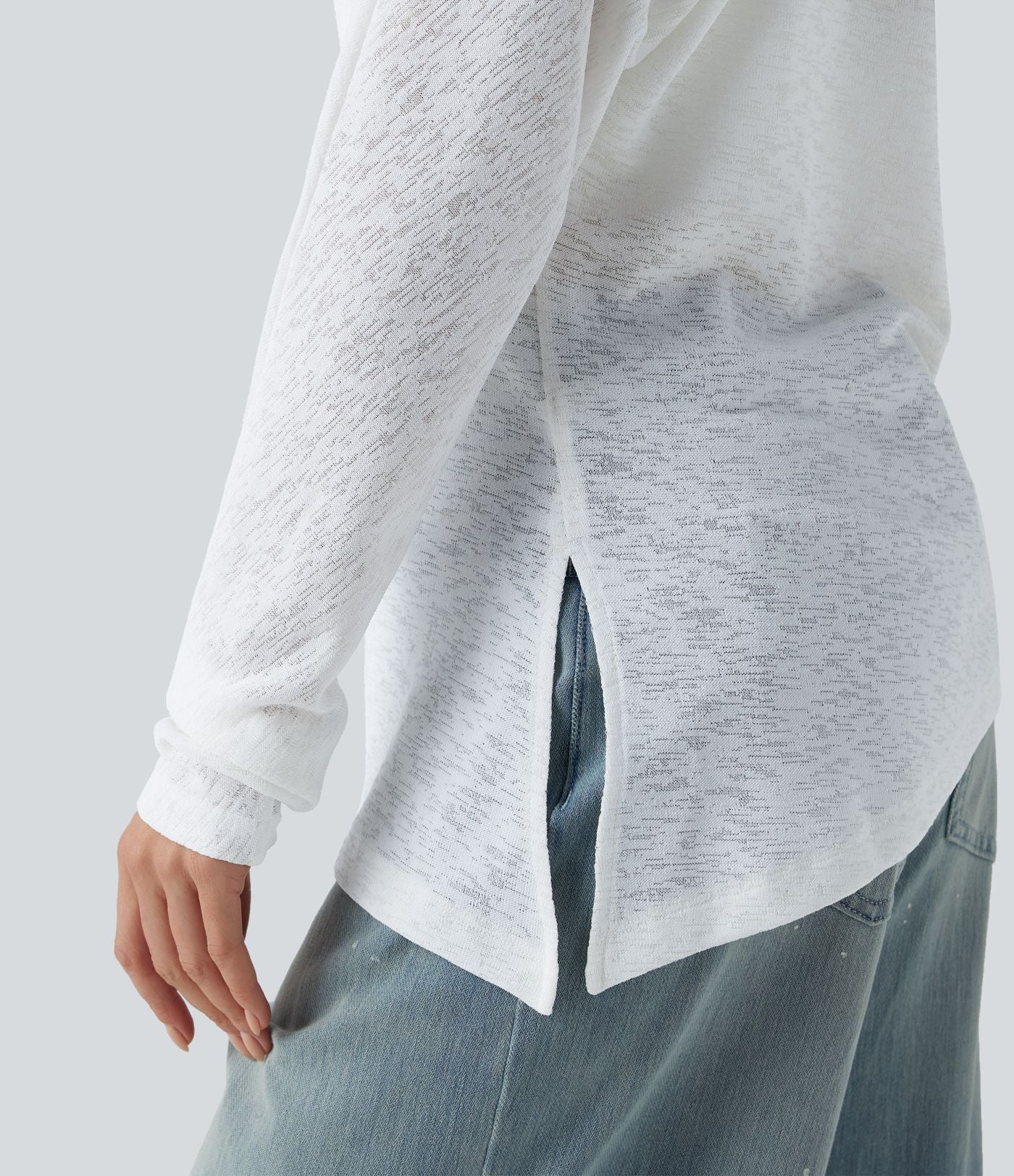 T-shirt décontracté semi-transparent une épaule dénudée à manches longues et ourlet asymétrique