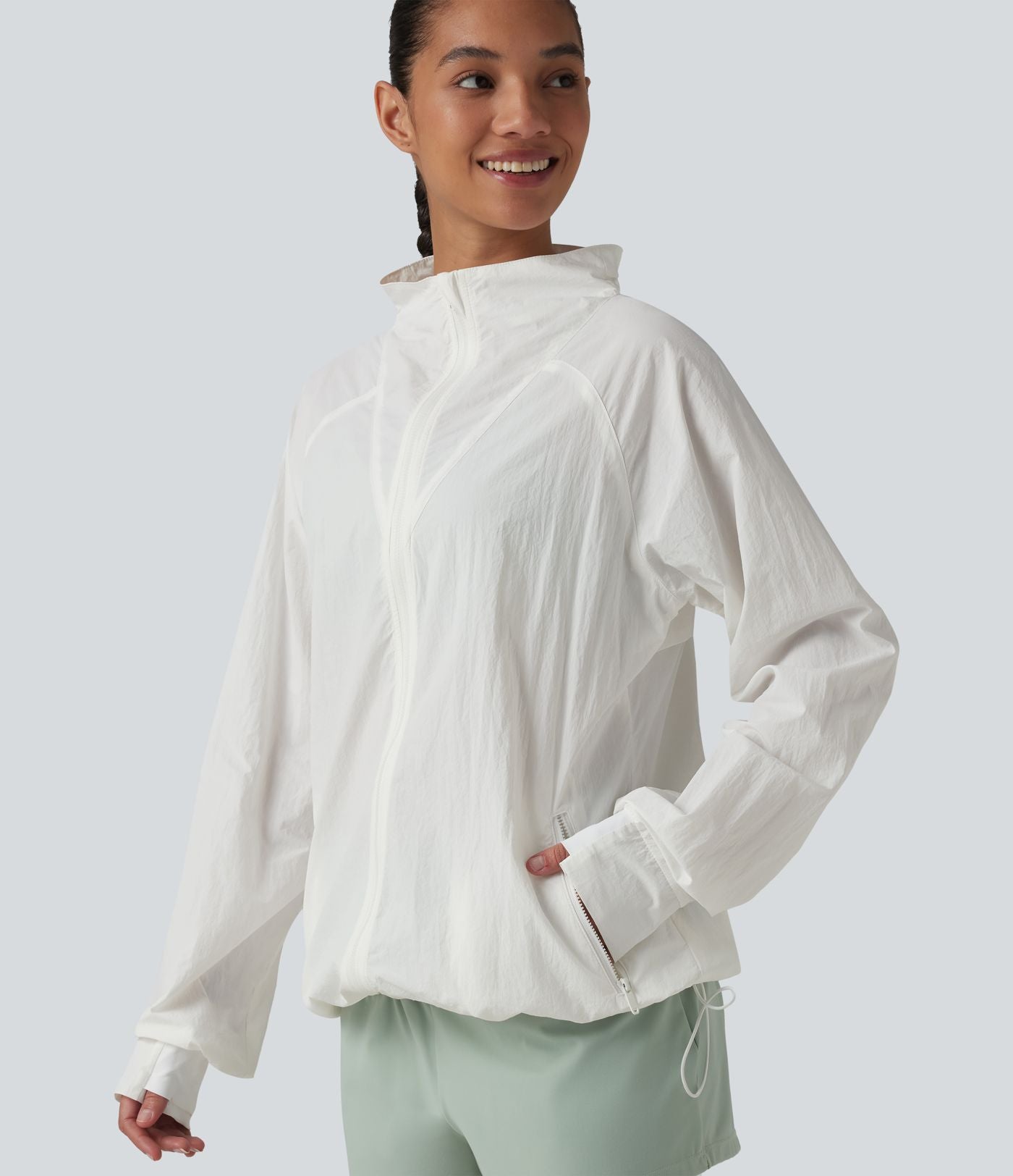 Coupe-vent casual à col droit avec trou pouces, cordon de serrage et poches