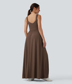 Robe maxi fluide dos nu, avec brassière intégrée et poches