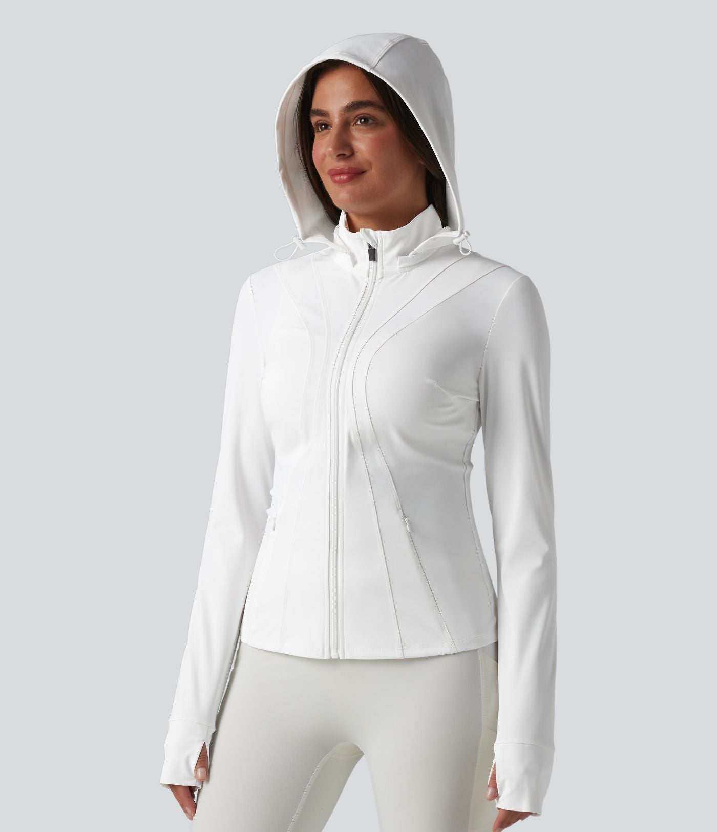 Veste de randonnée ajustée capuche amovible à trous pouces ourlet volants