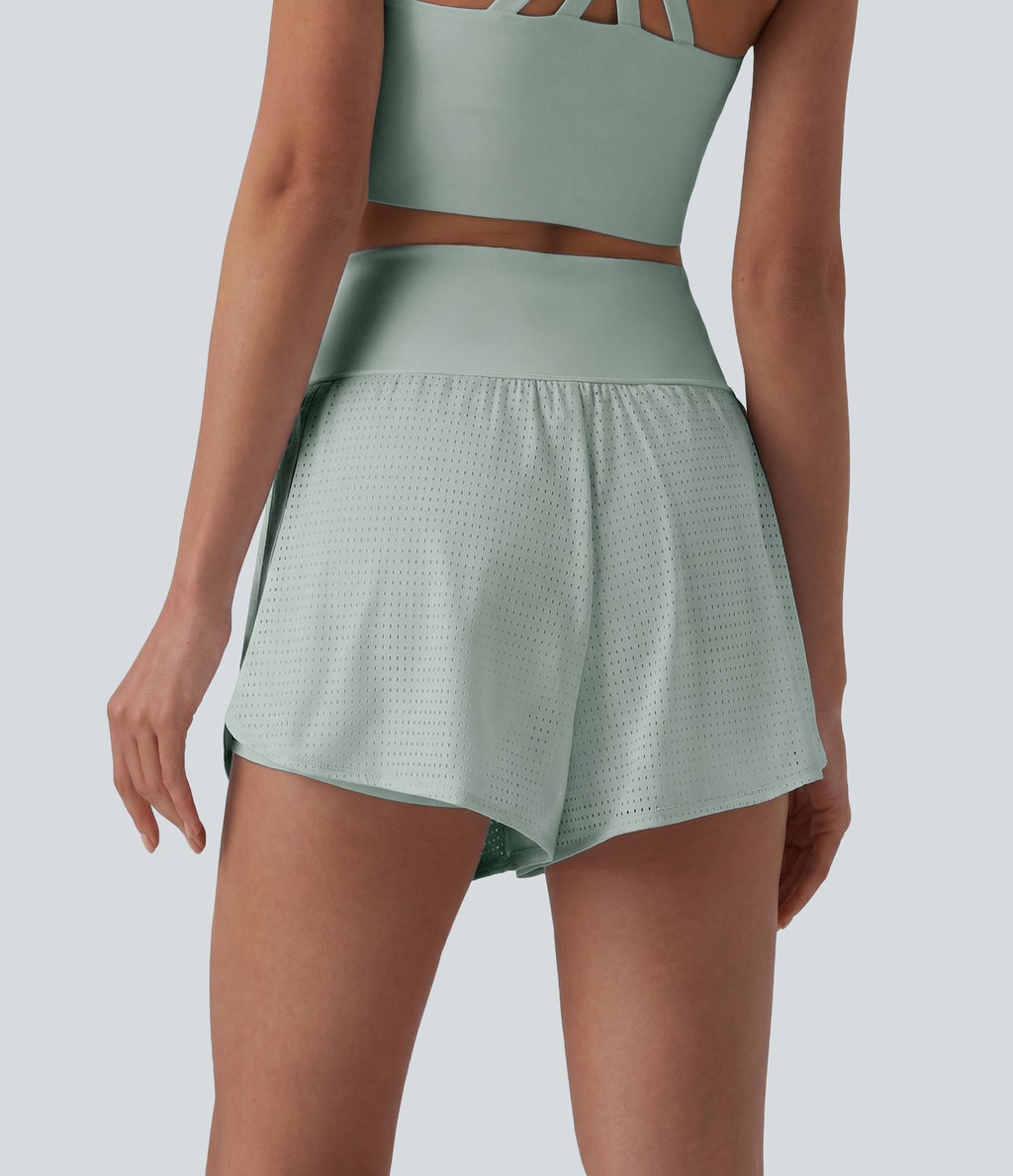 Short yoga 2-en-1 gainant taille haute à pois réfléchissants, ourlet arrondi croisé et œillets avec poches