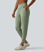 Jogging de yoga SoftlyZero™ taille haute, coupe fuselée et croisée, avec poches - Protection solaire UPF50+
