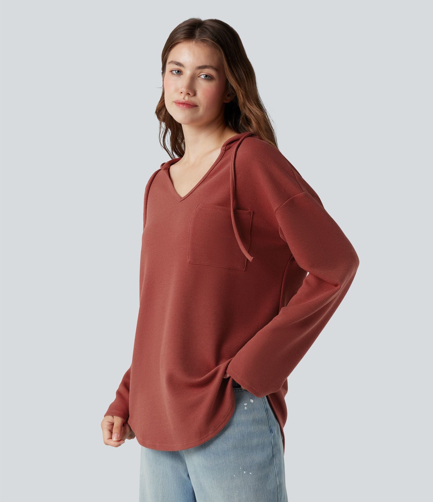 Sweat-shirt à capuche gaufré cordon de serrage manches longues ourlet arrondi avec poche