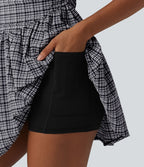 Robe de tennis active mini 2-en-1 à carreaux froissée à séchage rapide avec brassière intégrée, bretelles réglables et poches — Easy Peasy