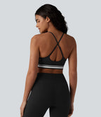 Brassière de sport SoftlyZero™ Plush à maintien léger, dos croisé ouvert, rayures color block et soutien intégré