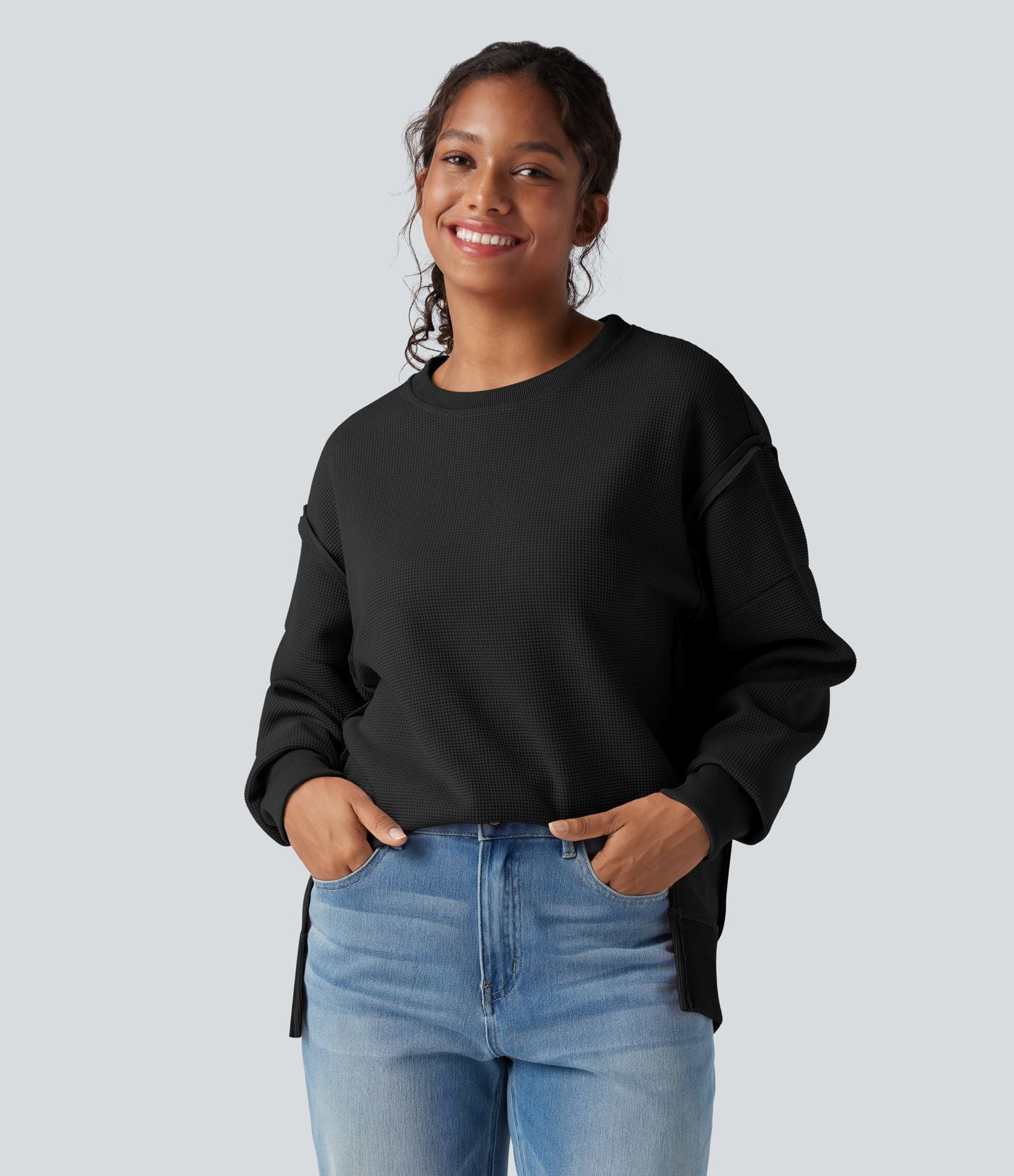 Sweat-shirt gaufré col rond ourlet fendu manches longues