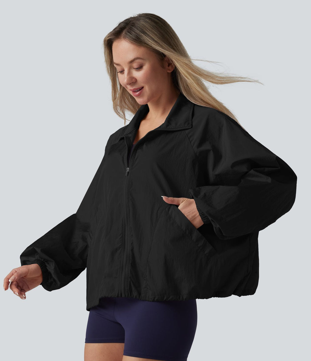 Veste de sport déperlante col montant manches longues zippée avec poches