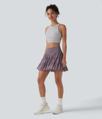 Jupe-short de tennis mini taille haute croisée fluide avec poches