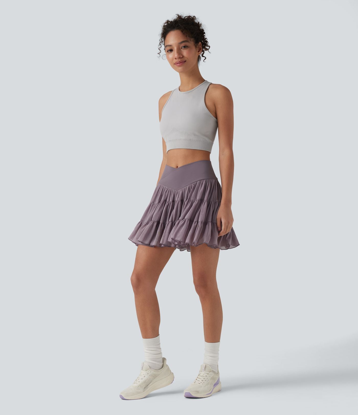 Jupe-short de tennis mini taille haute croisée fluide avec poches