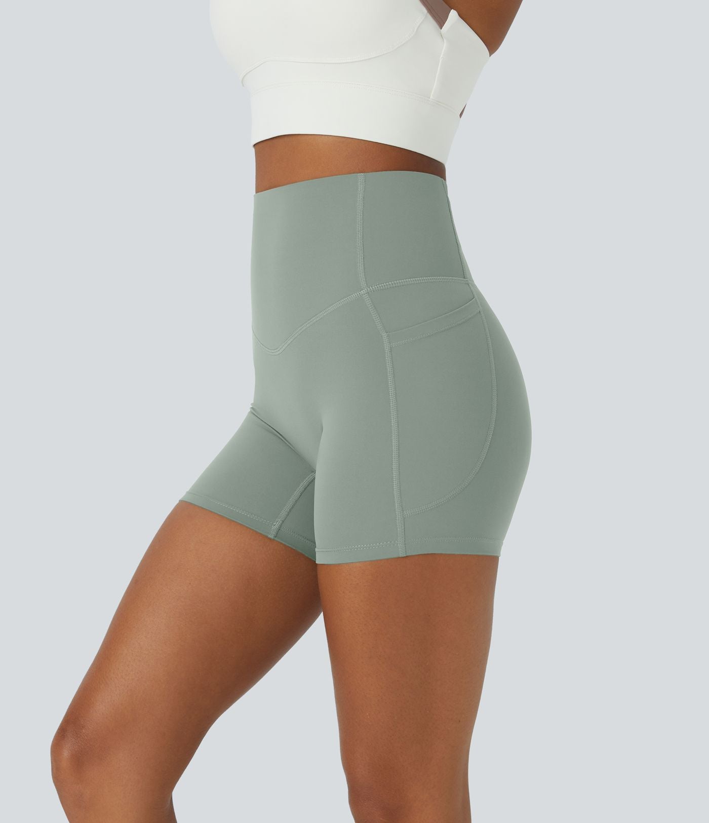 Short cycliste d'entraînement gainant taille haute UltraSculpt™ SoCinched à poches latérales 12,5 cm