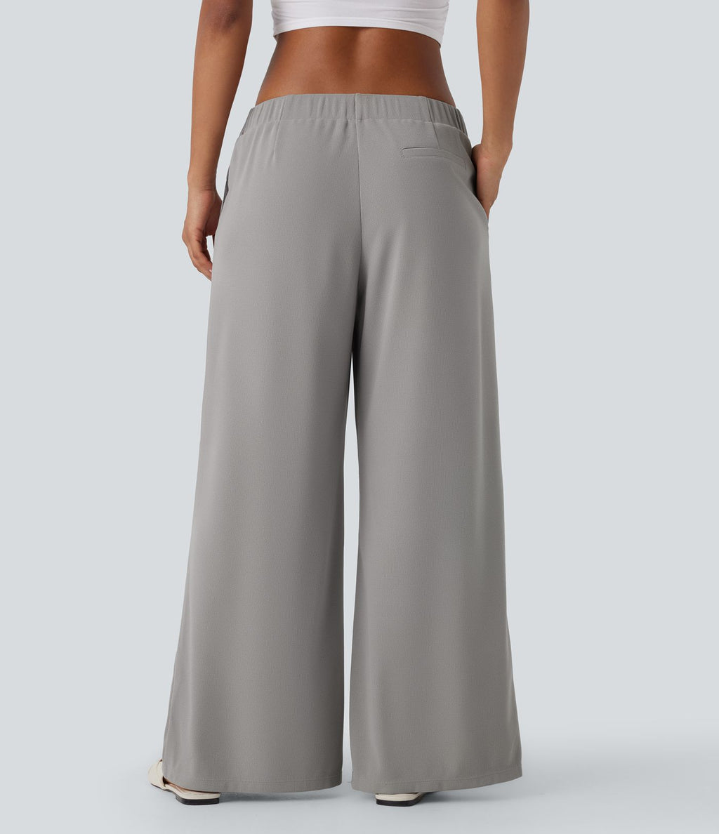 Pantalon décontracté taille basse à jambes larges en tissu gaufré avec poches latérales