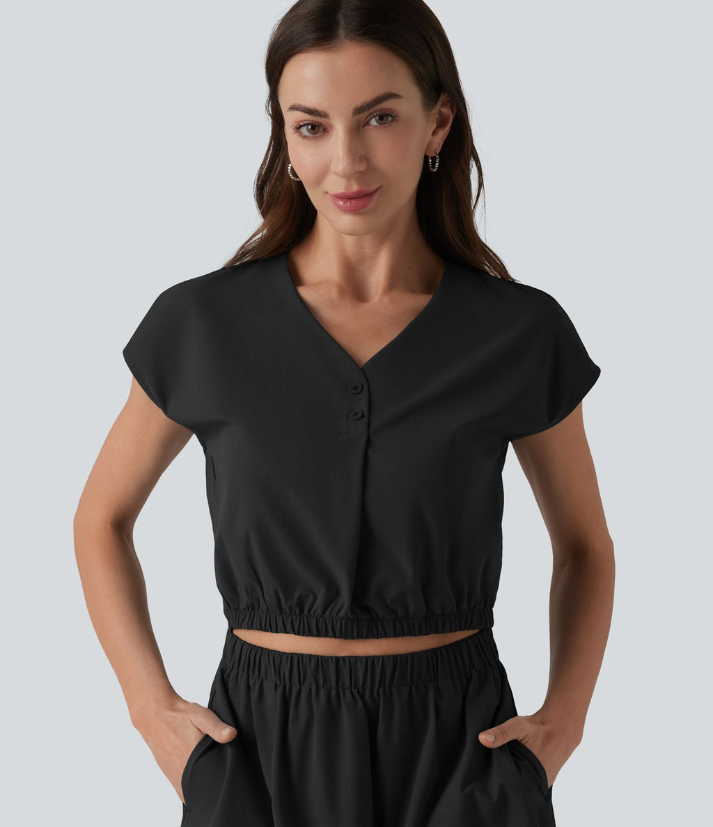 Robe col V manches courtes à découpes en popeline extensible avec poches