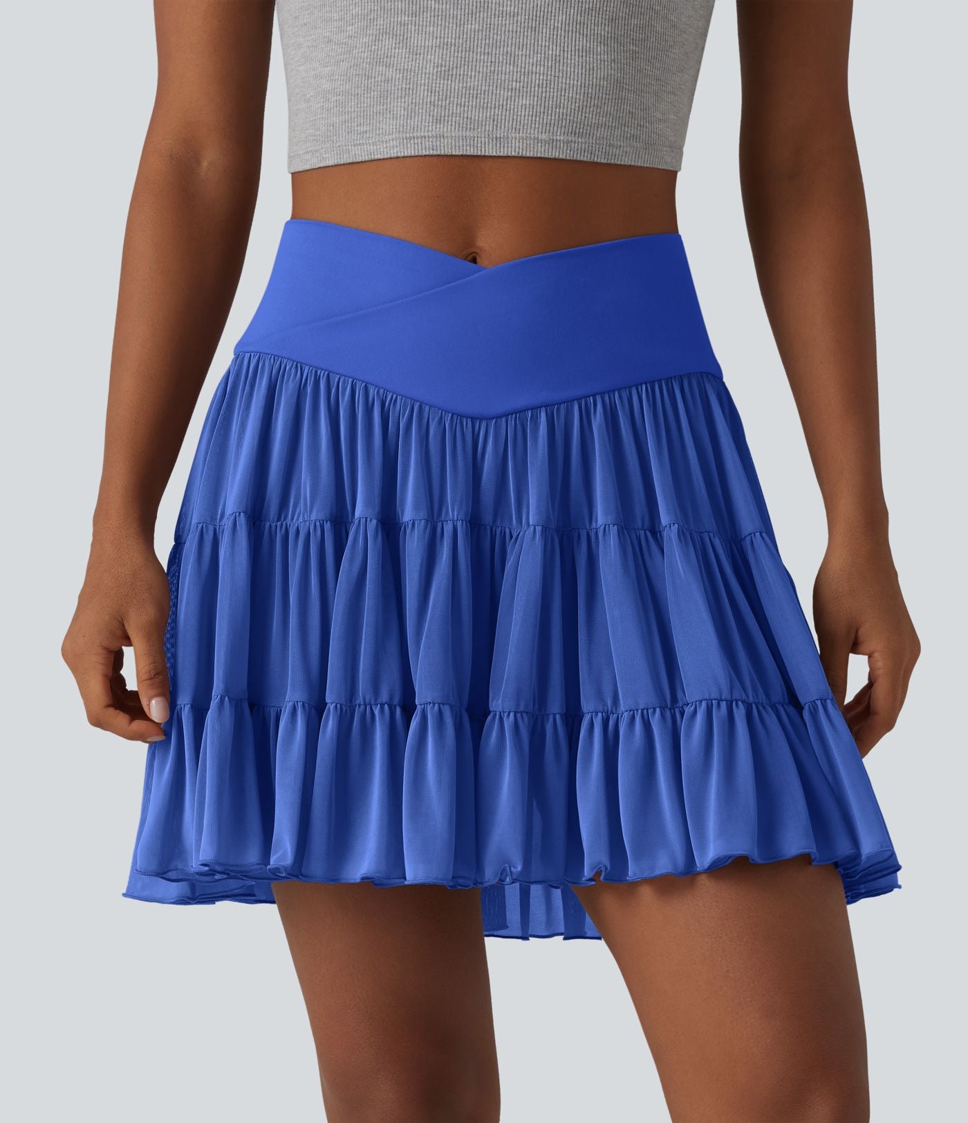 Jupe mini de tennis 2 en 1 croisée évasée taille haute avec poches - longueur allongée