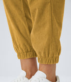 Pantalon décontracté en velours côtelé avec taille mi-haute, boutons et fermeture éclair