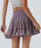 Jupe-short de tennis mini taille haute croisée fluide avec poches
