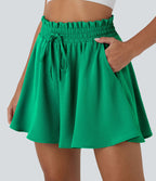 Short large décontracté taille haute façon paperbag avec cordon, poches latérales et aspect lin