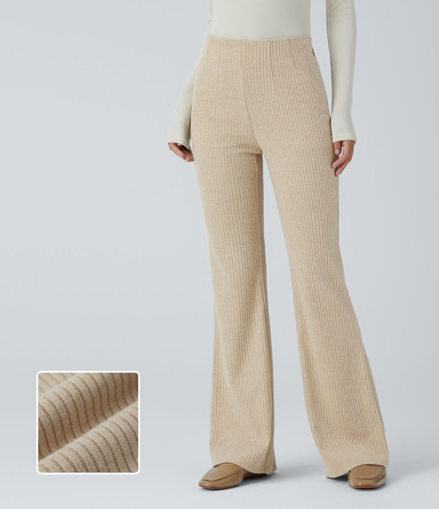 Pantalon décontracté évasé en maille côtelée à taille haute et poches zippées latérales