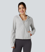 Veste de randonnée à capuche, manches longues, passants pouces et zip avec poches - UPF40+