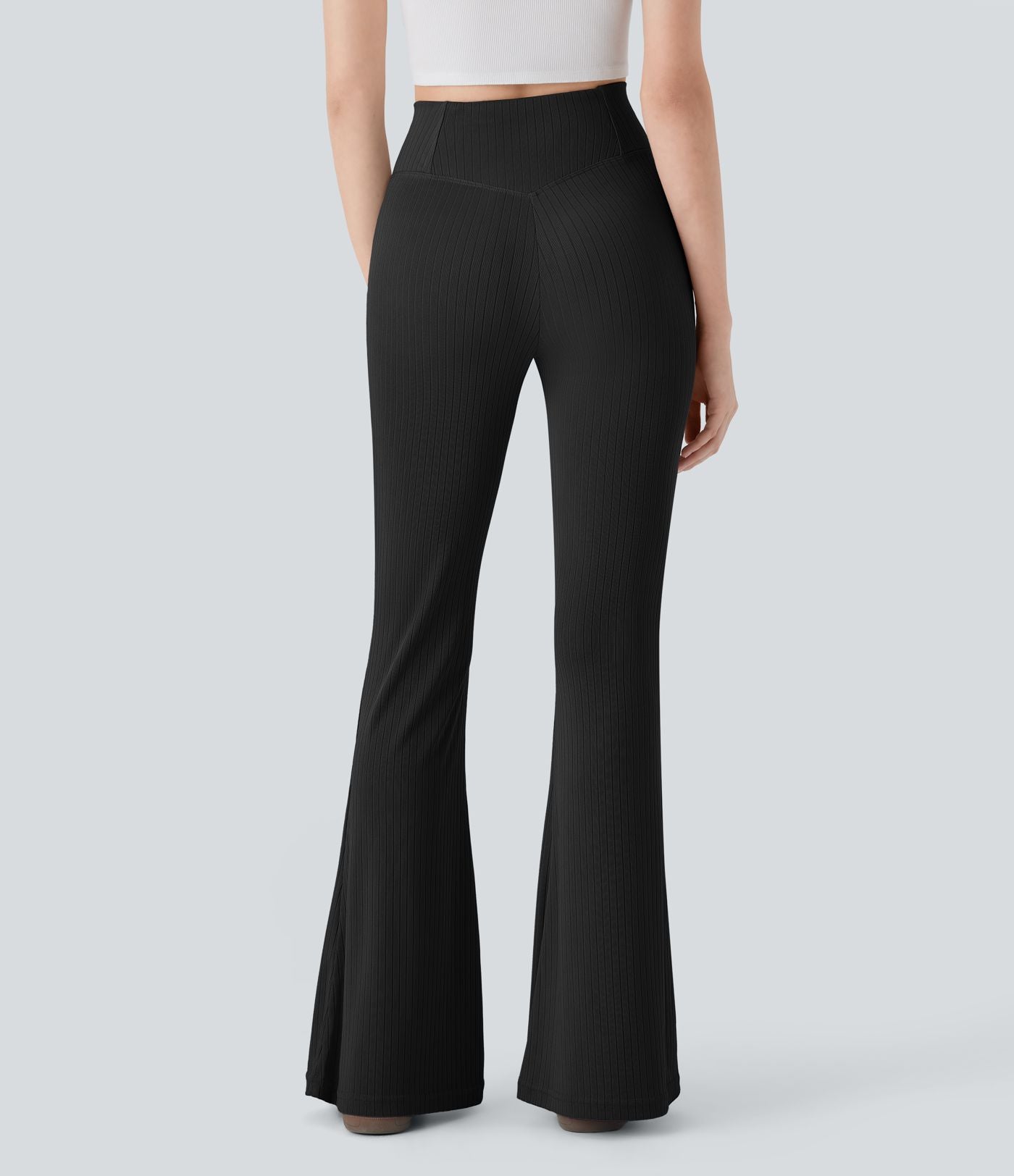 Pantalon large fluide côtelé à taille haute croisée avec poche arrière