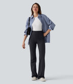 Pantalon tailleur évasé à rayures taille haute avec poches
