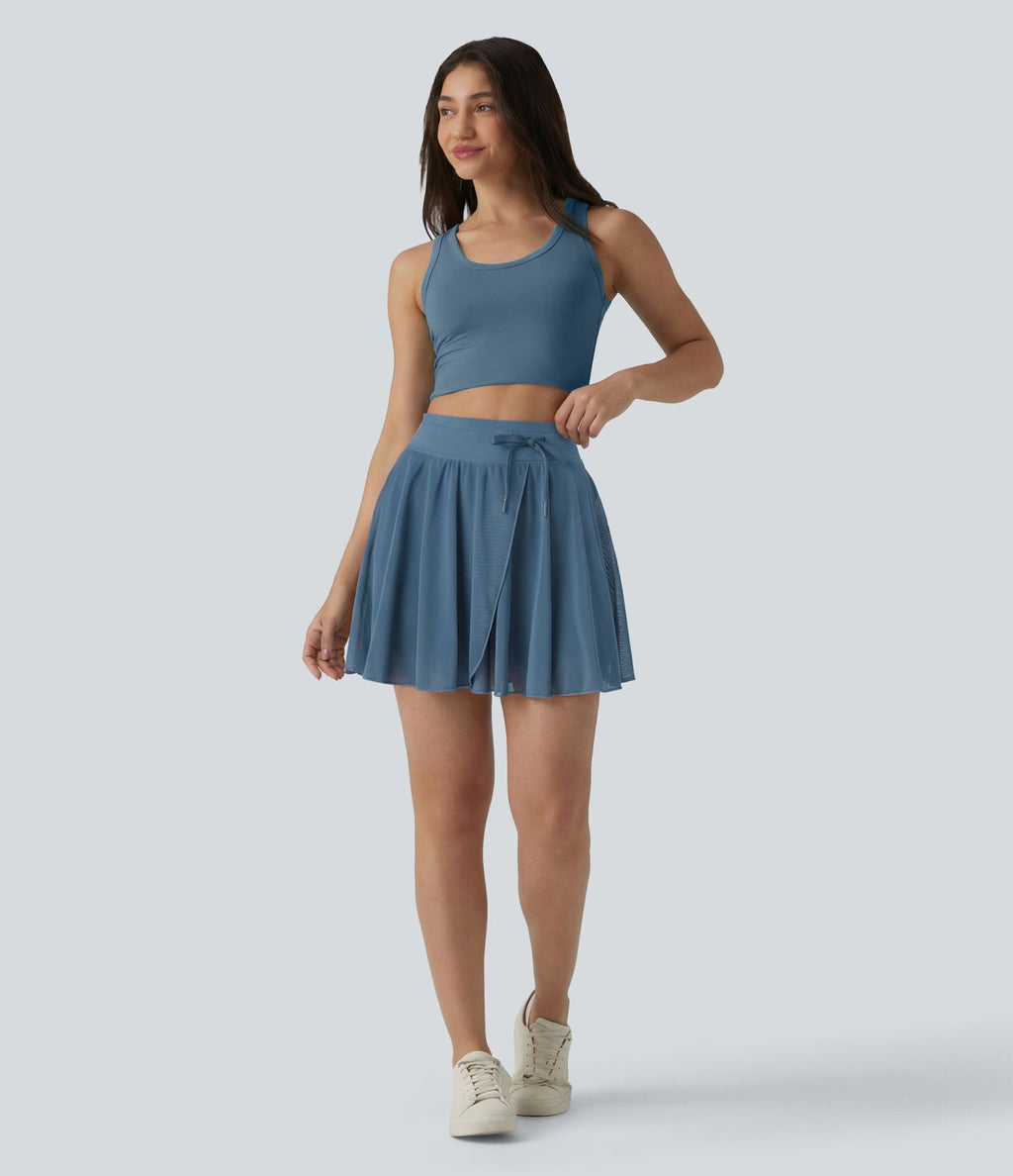 Jupe mini fluide évasée 2-en-1 taille haute à cordon, empiècements en mesh contrastant, avec poche, version plus longue