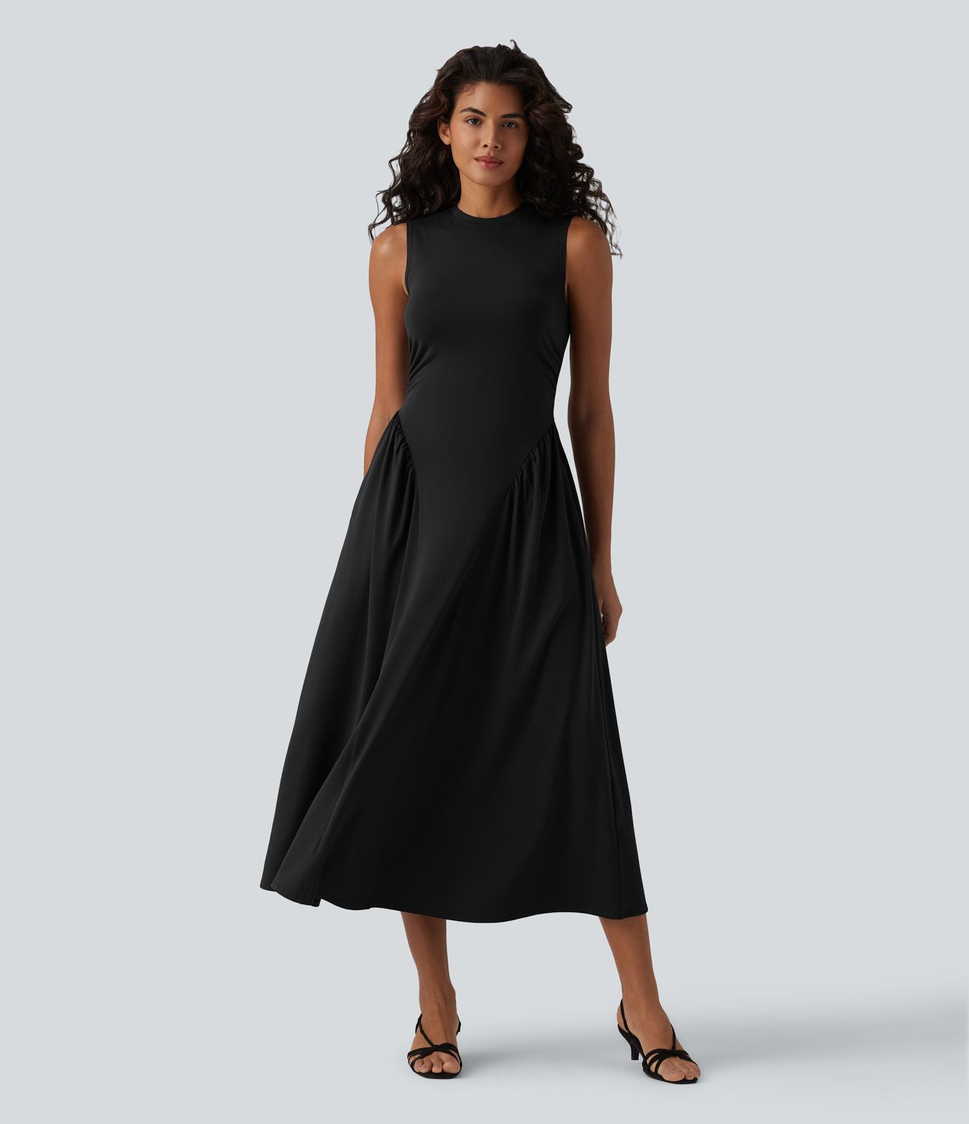 Robe midi casual fluide sans manches à col rond avec poches