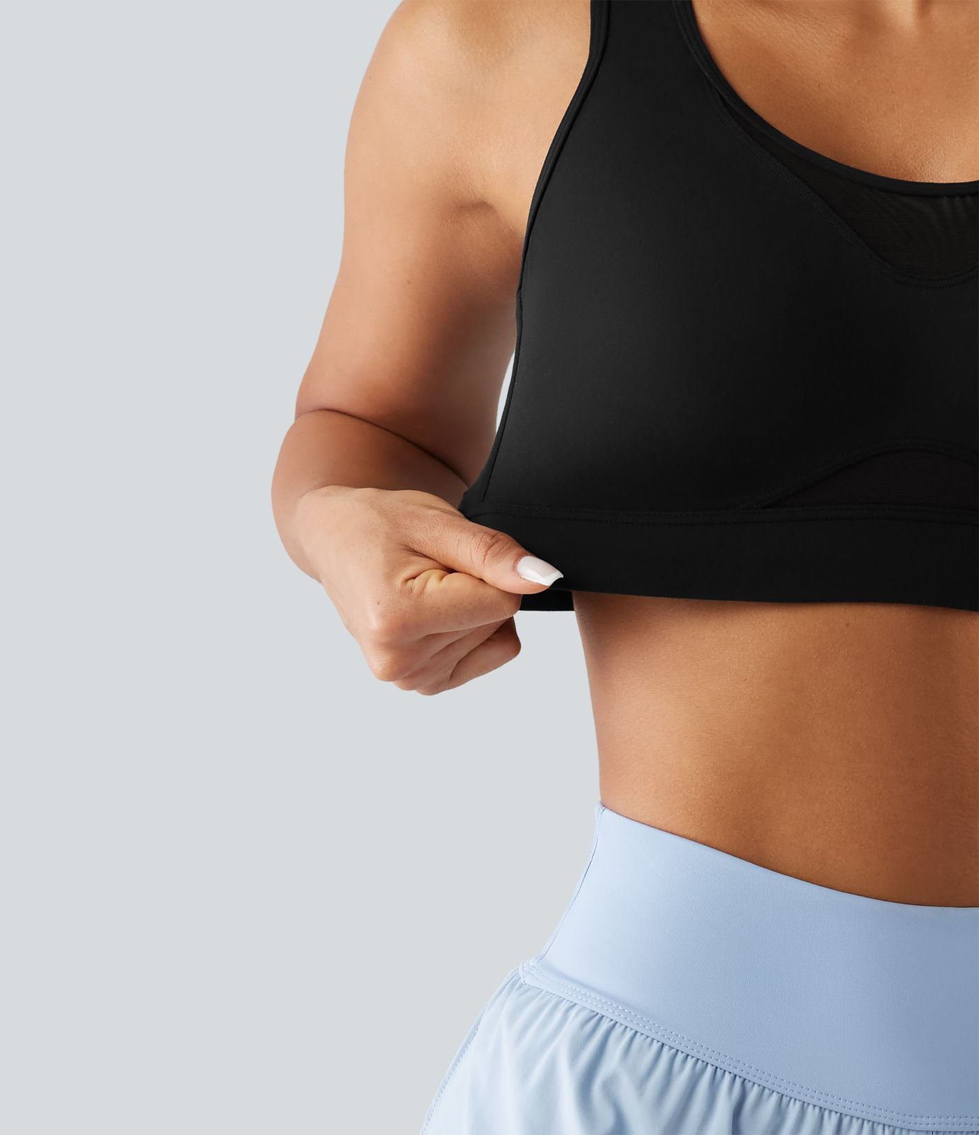 Brassière de sport d'entraînement maintien fort en mesh contrasté avec boucle ajustable et coussinets non amovibles
