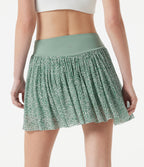 Jupe de sport mini 2-en-1 fluide taille mi-haute en mesh léopard avec poche