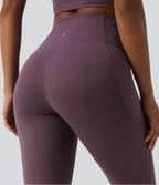 Legging de sport SoftlyZero™ taille haute avec empiècements en dentelle contrastée et poches – UPF 50+