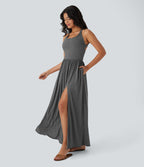 Robe longue fluide fendue avec poches latérales, dos nu et effet torsadé