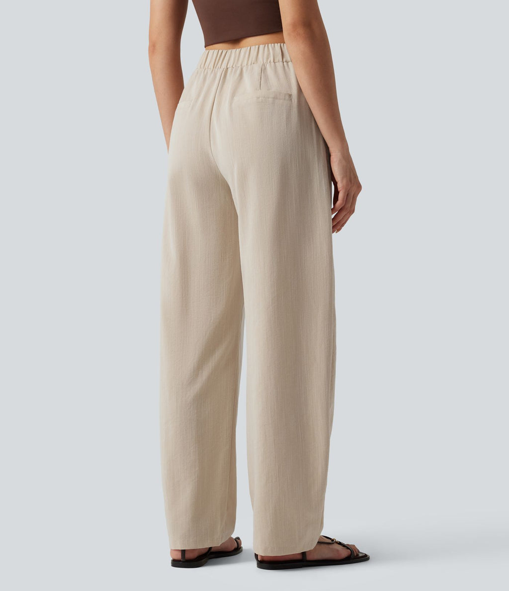 Pantalon tailleur asymétrique effet lin, taille moyenne, coupe ballon, à poches