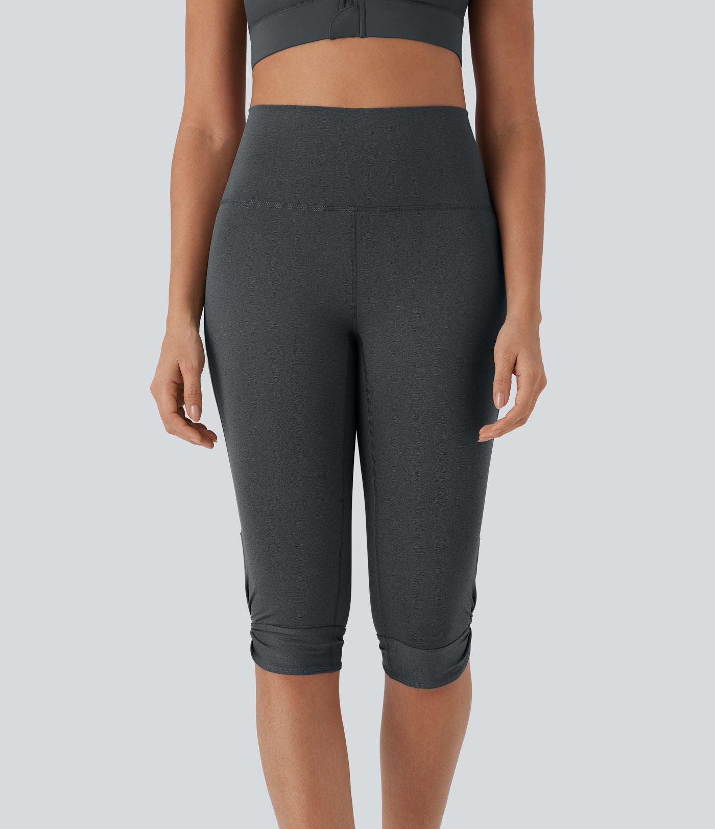 Leggings corsaire de yoga à taille haute, découpes, détails torsadés, séchage rapide et poche