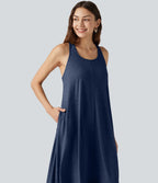 Robe midi fluide à dos nageur, soutien-gorge intégré, ourlet asymétrique et poches