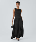 Robe longue à encolure bateau, bretelles asymétriques, côtés froncés et poches