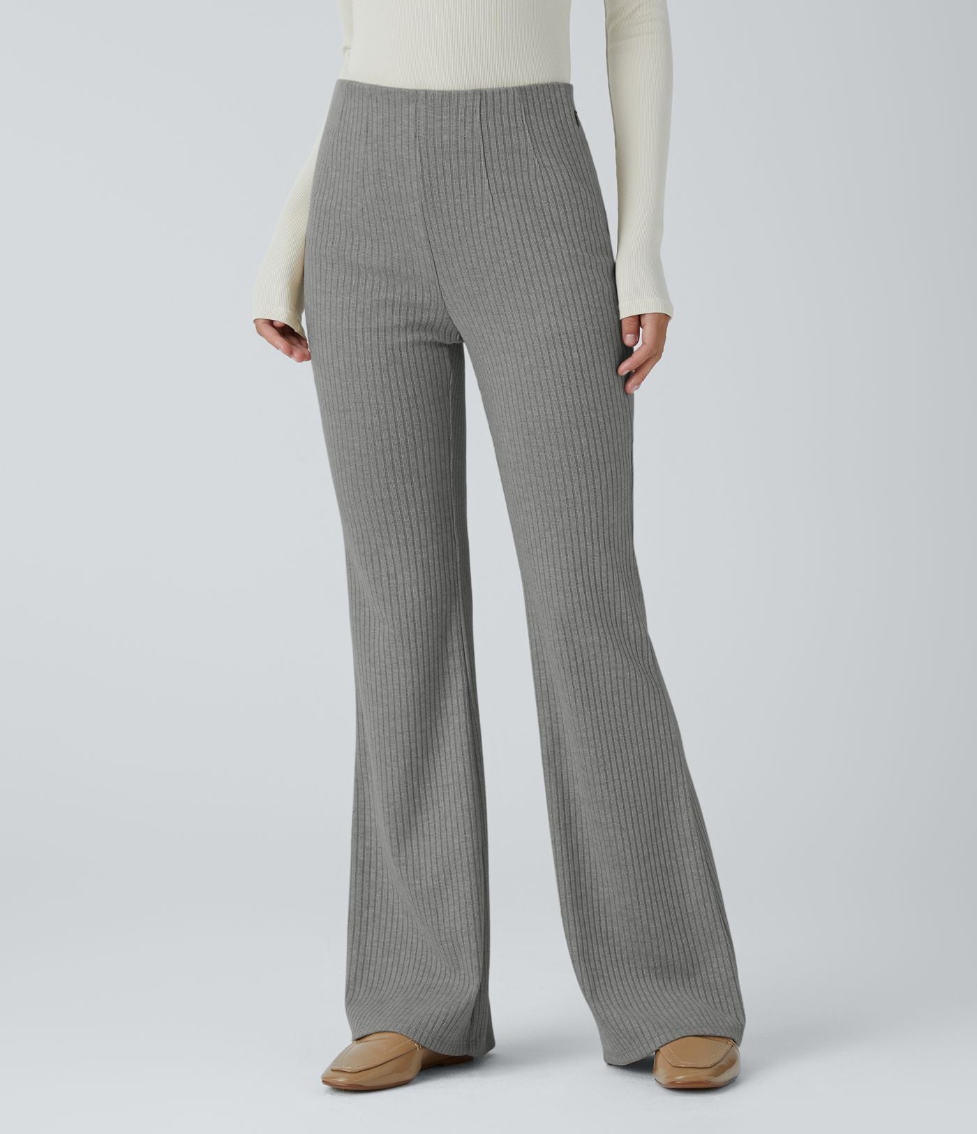Pantalon décontracté évasé en maille côtelée à taille haute et poches zippées latérales