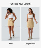 Jupe-short golf mini 2-en-1 taille haute à cordon de serrage et ourlet arrondi avec poches - Longueur plus longue
