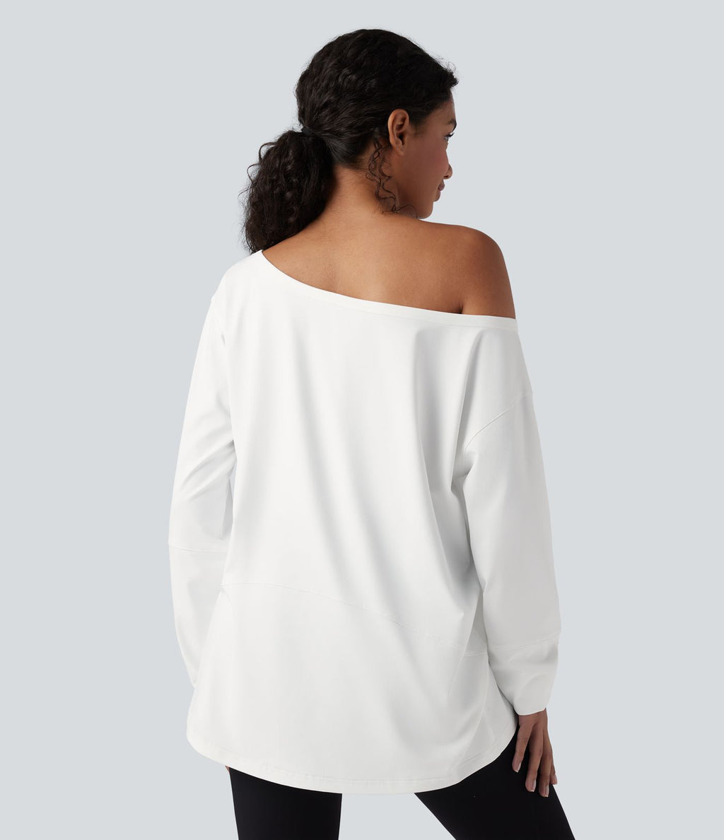 Haut de yoga ample asymétrique à manche longue