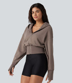 Sweat à capuche zippé avec manches raglan et passe-pouces