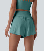 Short yoga 2-en-1 gainant taille haute à pois réfléchissants, ourlet arrondi croisé et œillets avec poches
