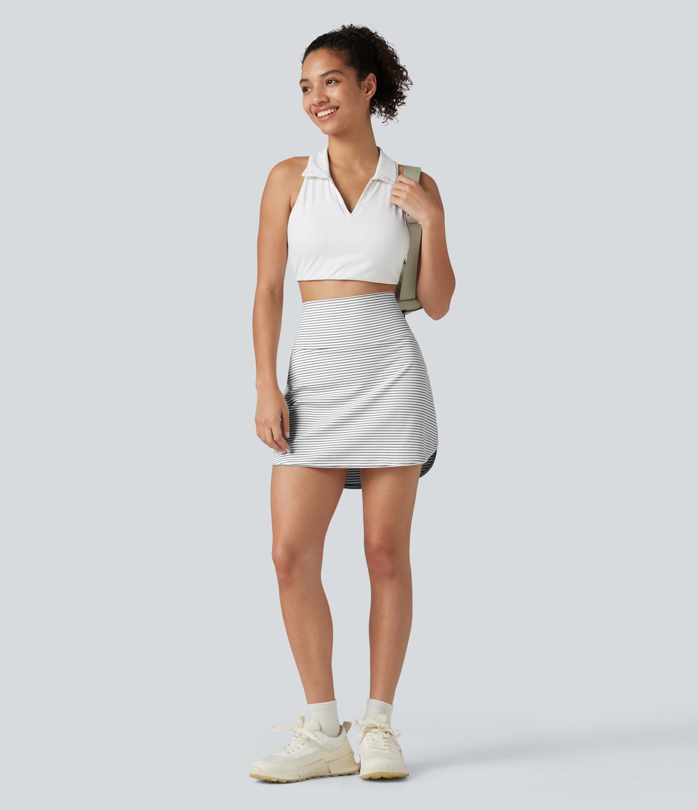 Mini-jupe de golf 2 en 1 à rayures, taille ultra haute, effet ventre plat, ourlet arrondi et poches