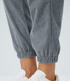 Pantalon décontracté en velours côtelé avec taille mi-haute, boutons et fermeture éclair