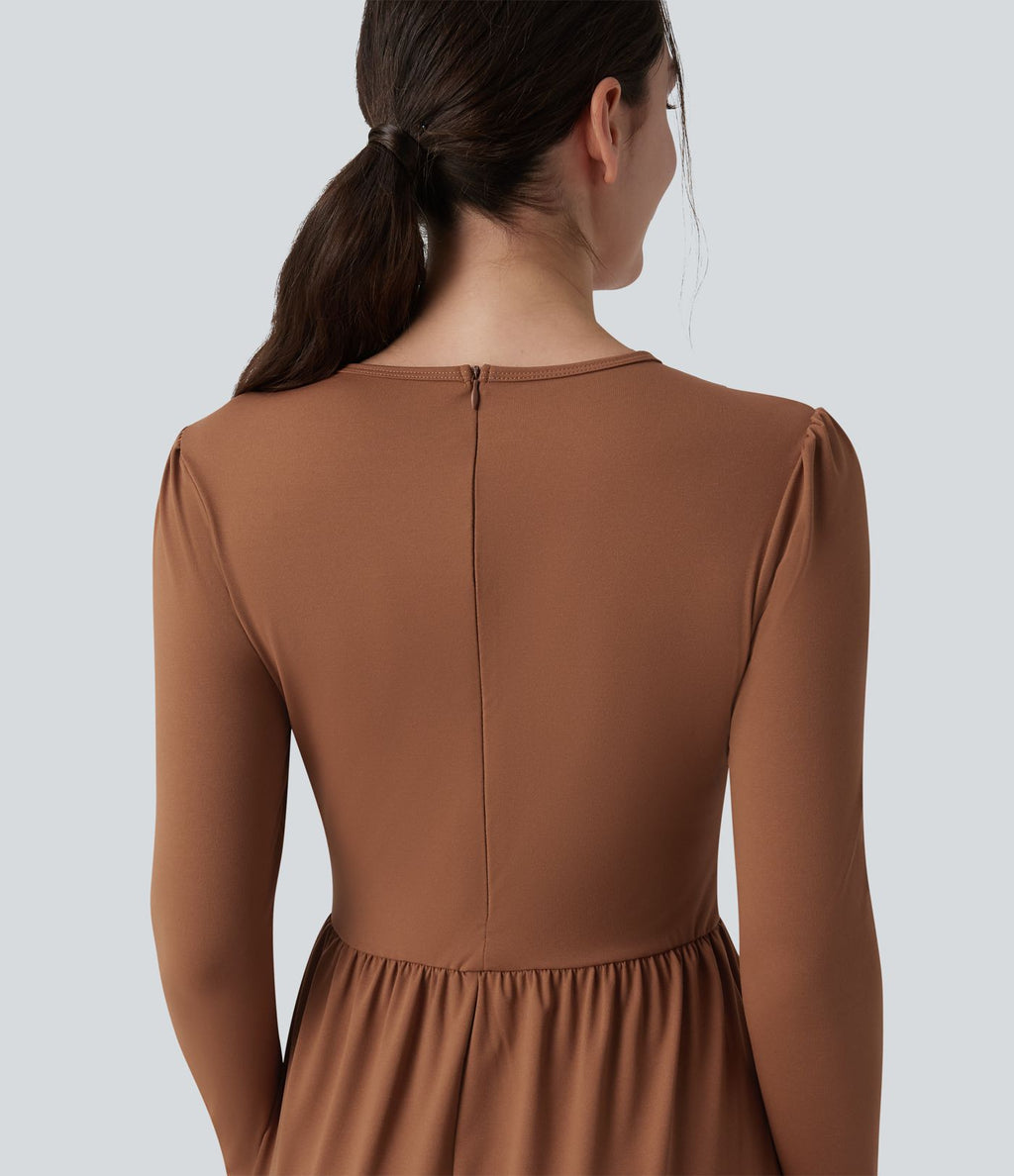 Robe tailleur mi-longue col rond manches longues ourlet à volants étagés