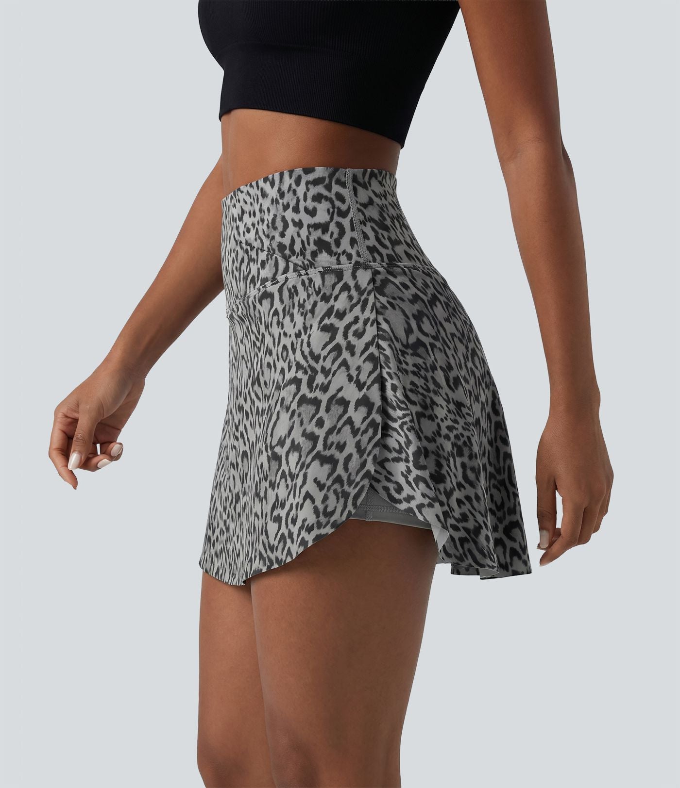 Jupe-short de tennis mini taille haute croisée imprimé léopard avec poches