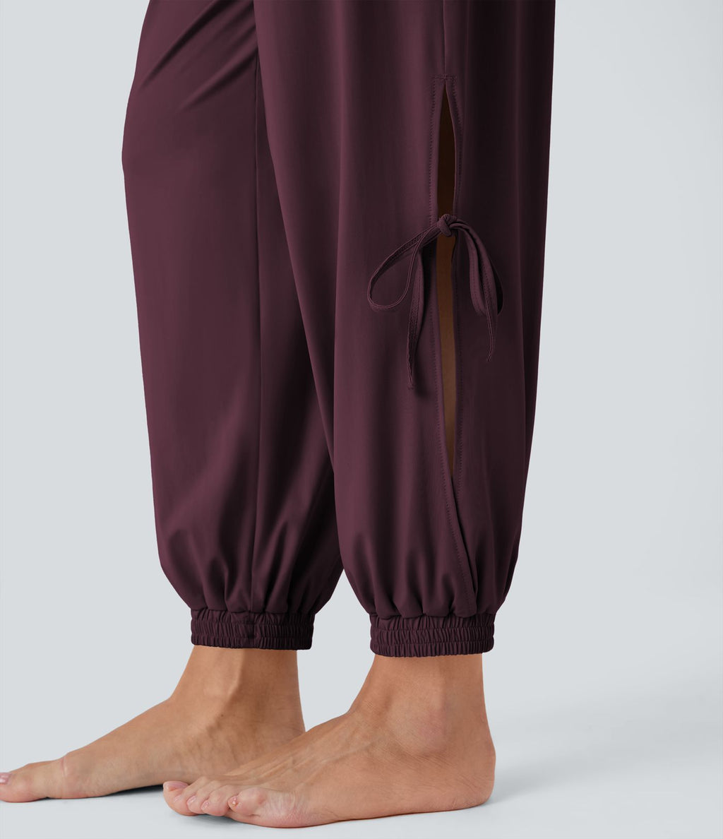 Combinaison de yoga col bateau sans manches dos nu avec découpes et poches latérales à cordon de serrage effet frais InstantCool, protection solaire UPF50+