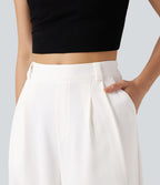 Pantalon tailleur large, taille moyenne, à poches
