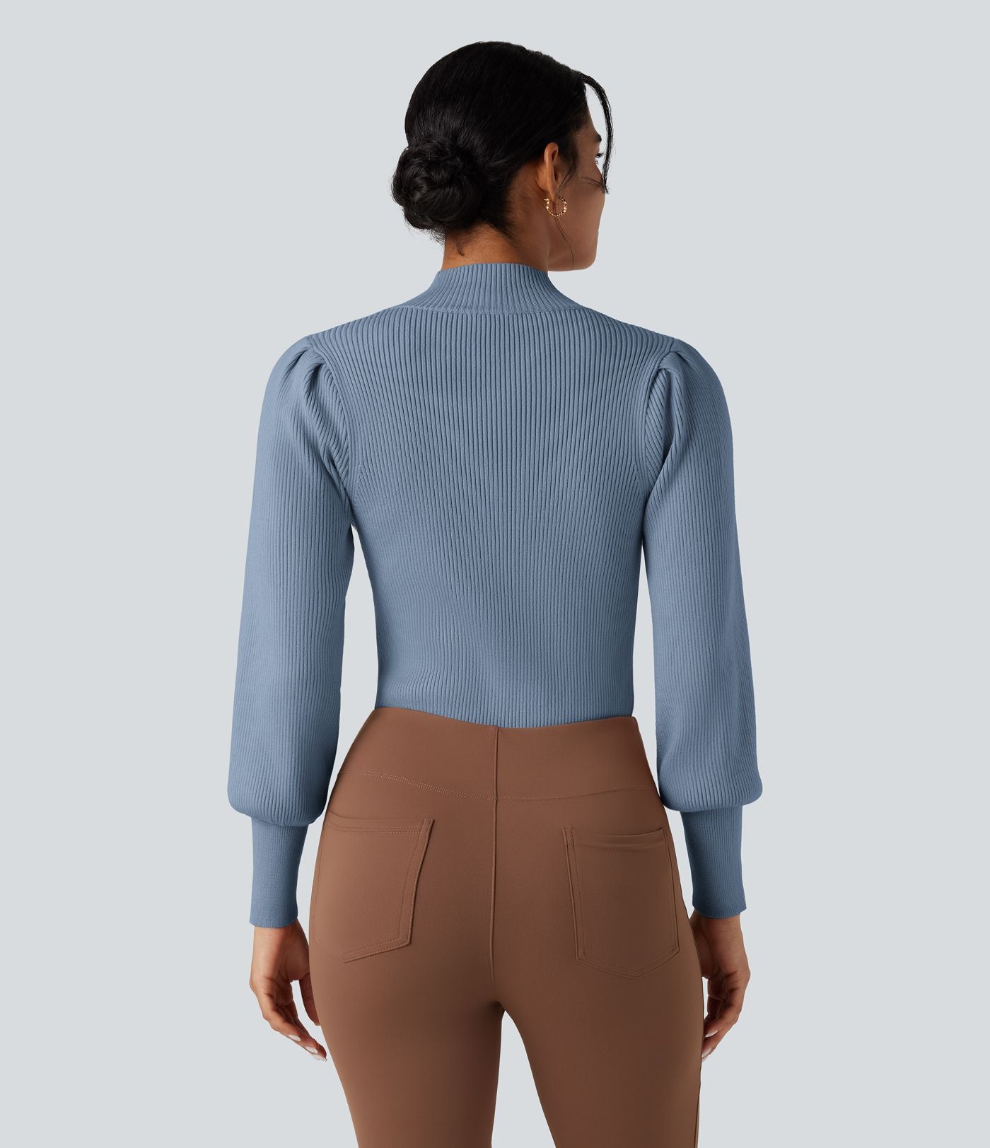 Pull col montant manches bouffantes longues