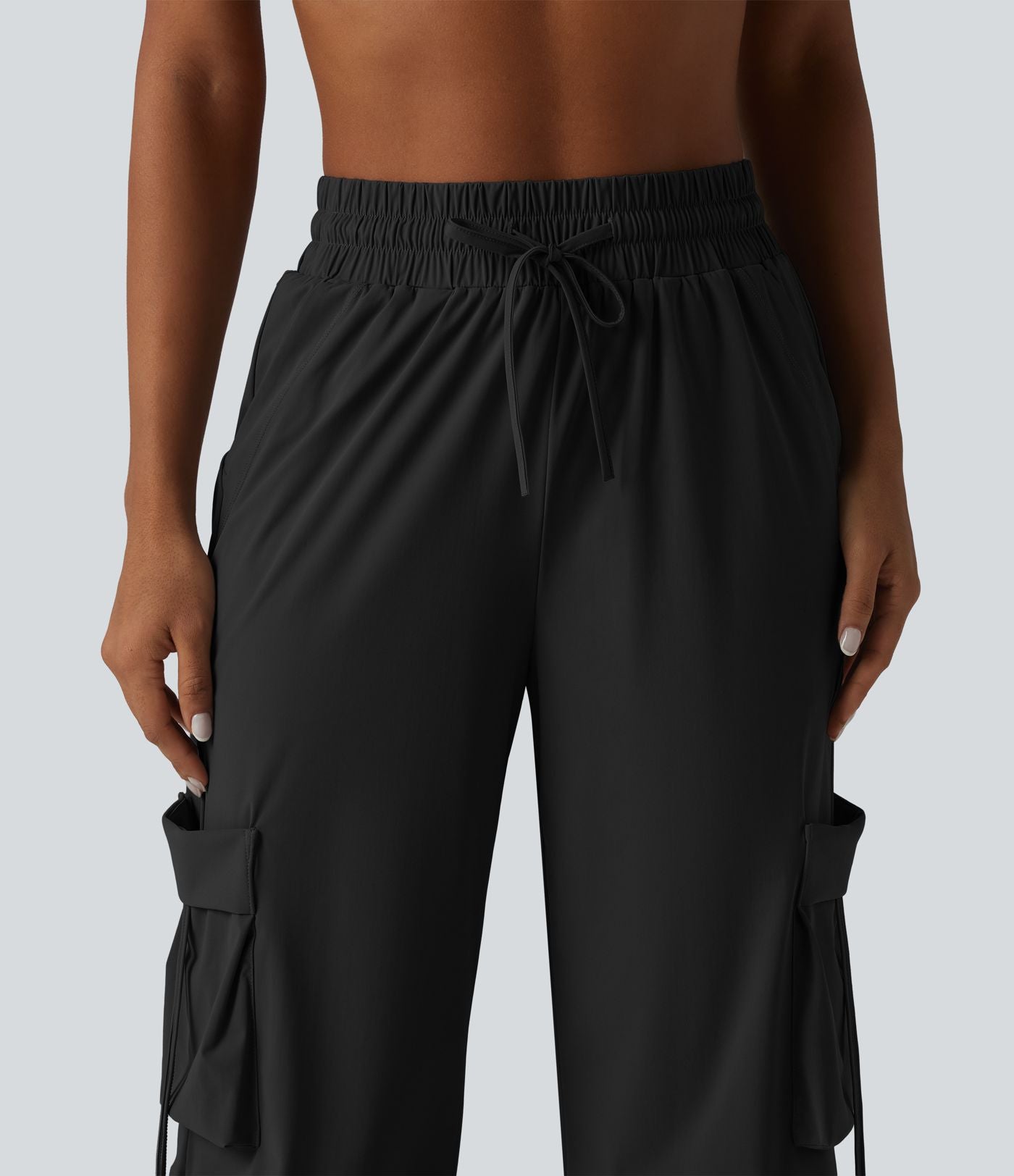 Pantalon cargo large fluide d'entraînement taille haute avec cordon de serrage, séchage rapide, à effet frais InstantCool et poches, protection solaire UPF40+