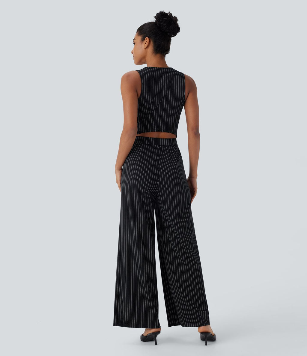 Combinaison tailleur rayée à jambes larges, décolleté en V, découpe et poches