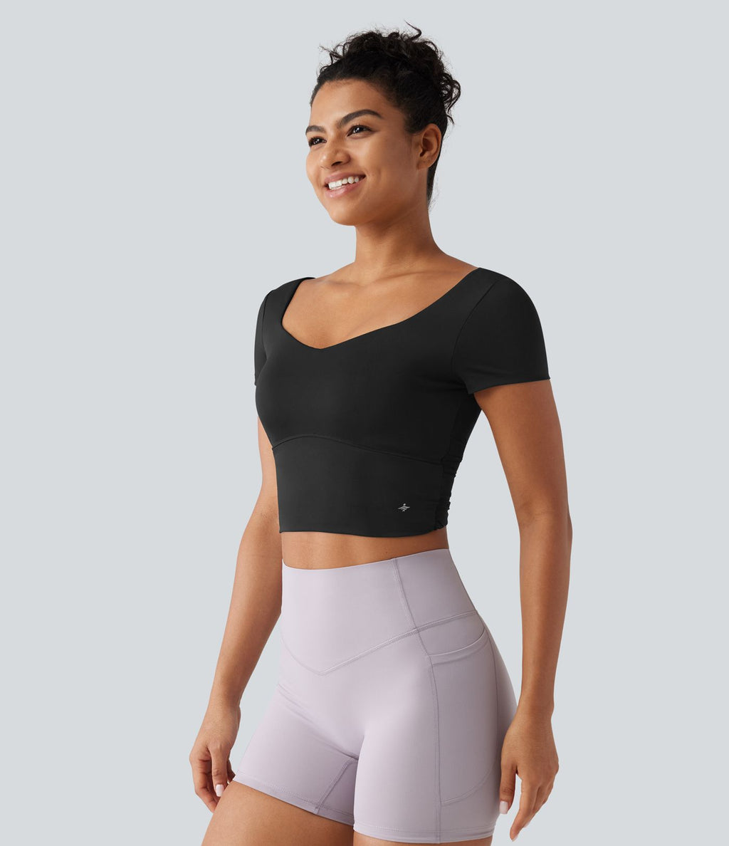 Haut yoga crop SoftlyZero™ séchage rapide Quick Dry à col diamant, manches courtes, mesh et coussinets amovibles